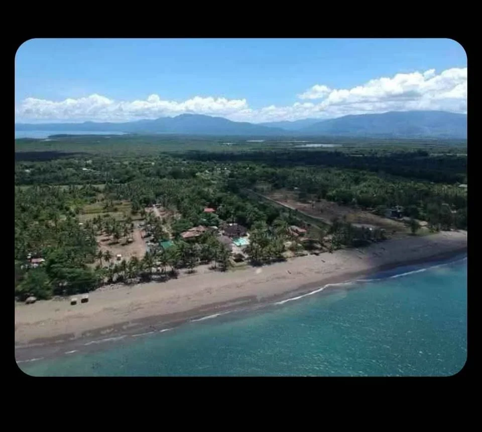 Aerial view of the coast near Silangan Sunrise