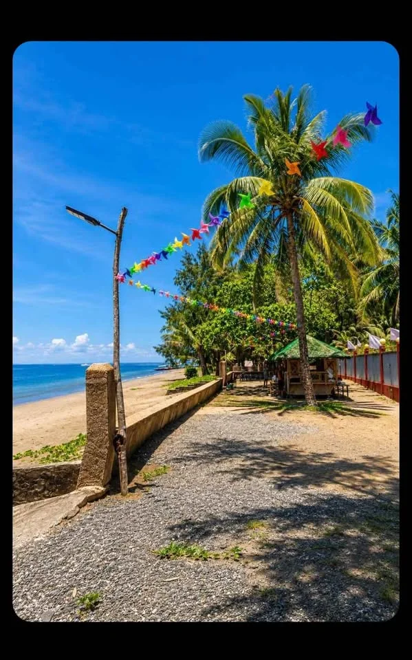 Actual walkway beside the beach near Silangan Sunrise
